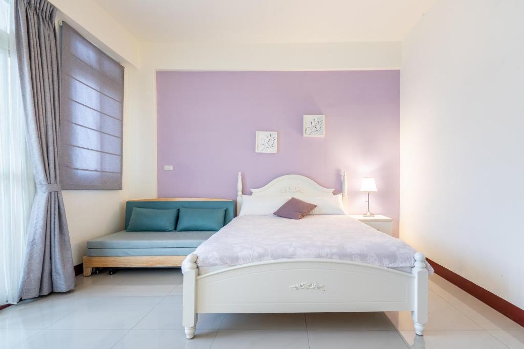 Postel nebo postele na pokoji v ubytování Happy Stay Inn