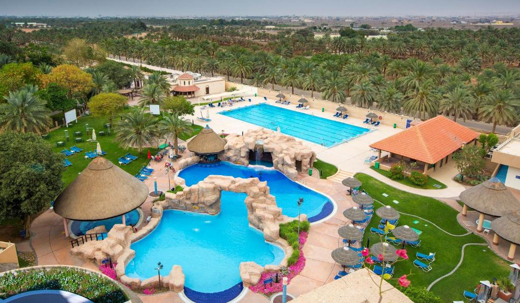an overhead view of a pool at a resort at Danat Al Ain Resort in Al Ain