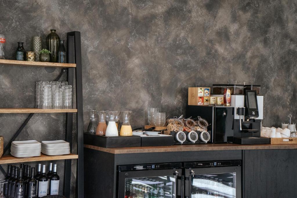 Příslušenství pro přípravu čaje a kávy v ubytování Hotel Beatrix