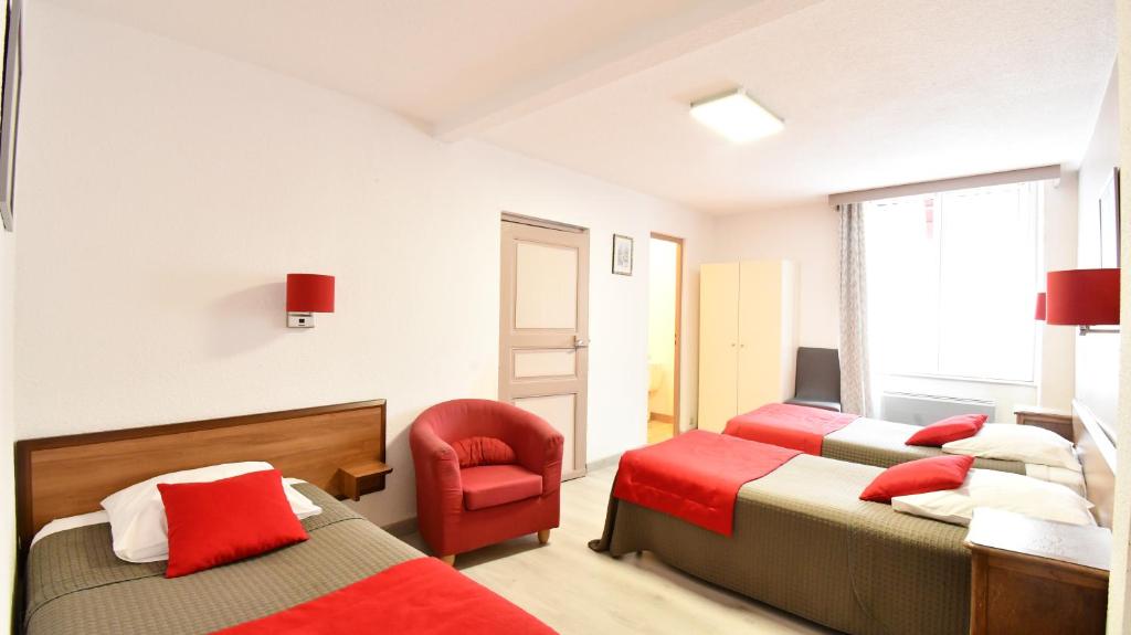 Postel nebo postele na pokoji v ubytování Hotel Fortin