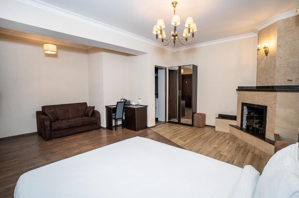 Postel nebo postele na pokoji v ubytování Siberia Hotel