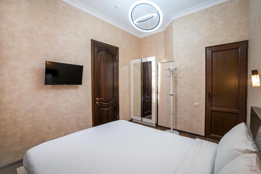 TV a/nebo společenská místnost v ubytování Siberia Hotel