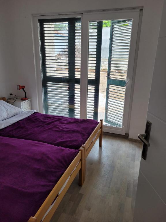 Postel nebo postele na pokoji v ubytování 2 bedroom apartment on the coast of the Adriatic! Watermelon Marina