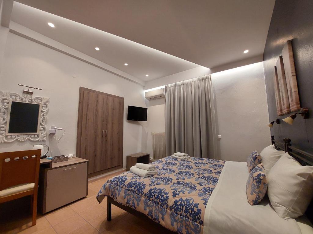TV a/nebo společenská místnost v ubytování Hotel Akti