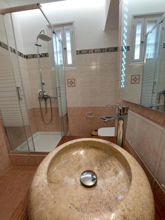 Koupelna v ubytování Hotel Akti