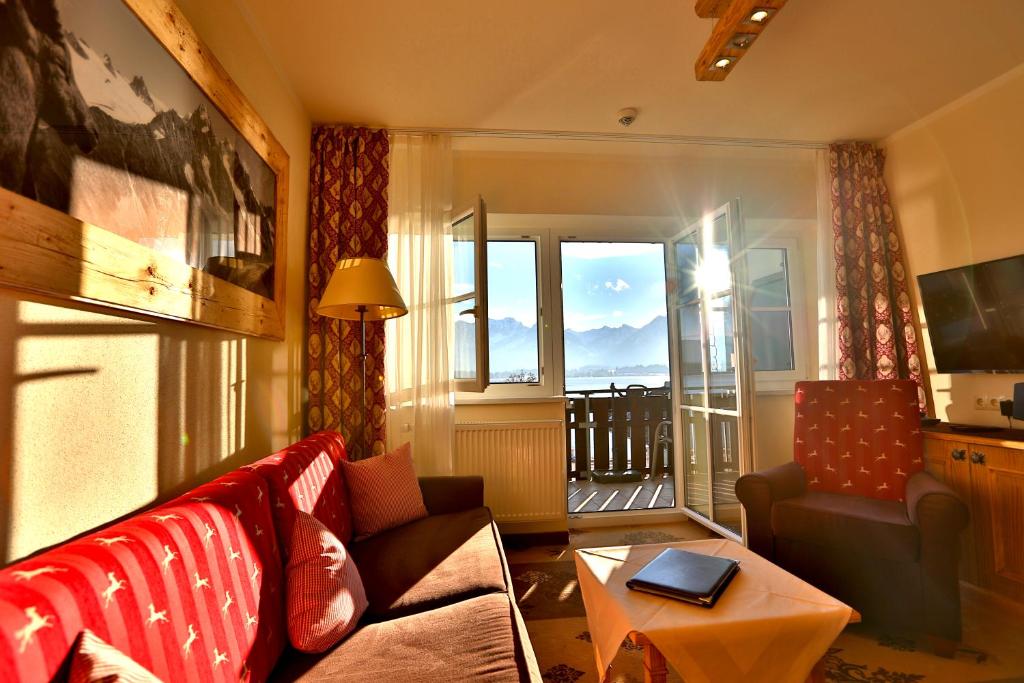 Een TV en/of entertainmentcenter bij Seehotel Hartung & Ferienappartements

