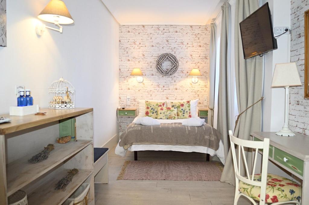 Postel nebo postele na pokoji v ubytování Ares Hotel