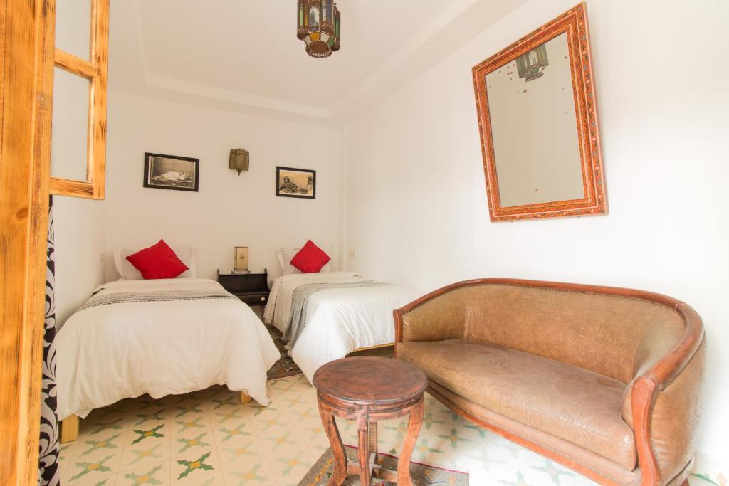 Postel nebo postele na pokoji v ubytování Riad Azul