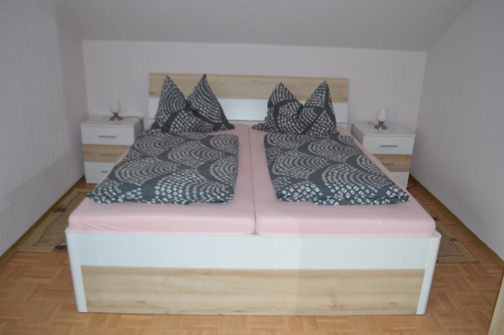 Postel nebo postele na pokoji v ubytování Gästehaus Maria