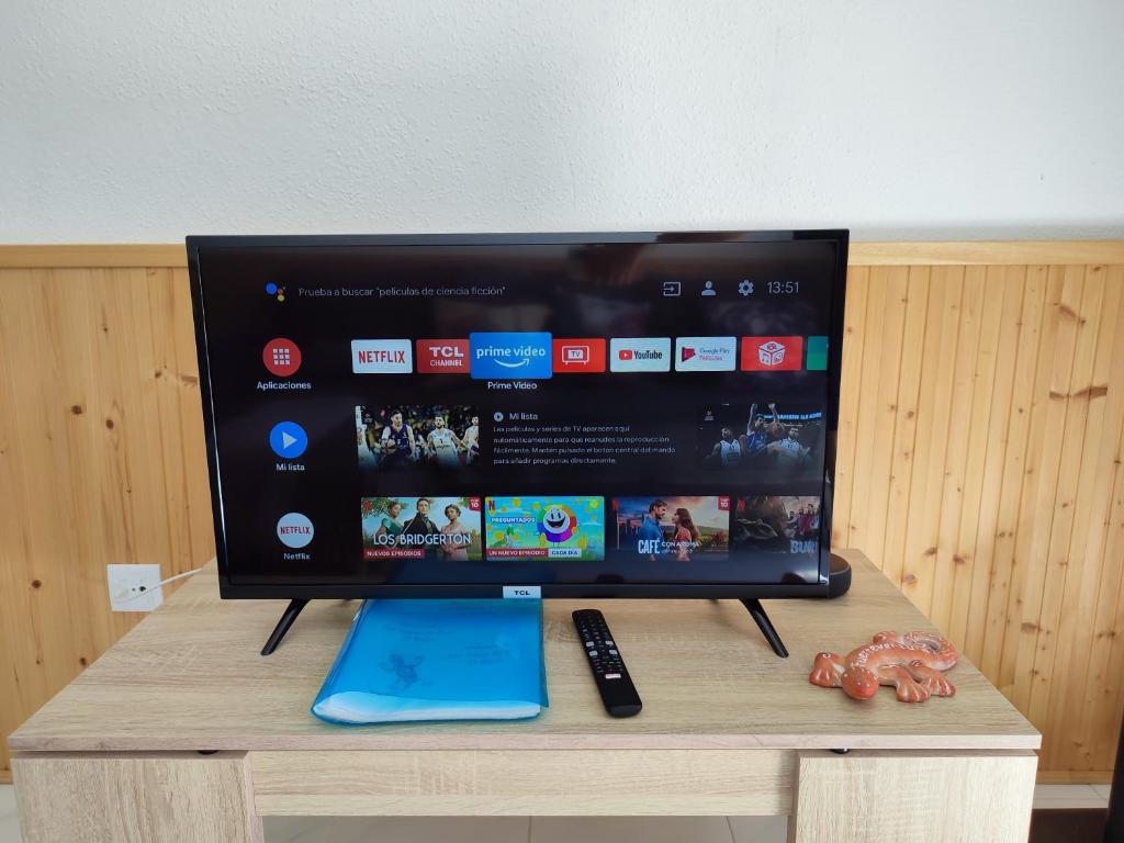 A television and/or entertainment centre at Apartment El Barco - Las Casas de Aron