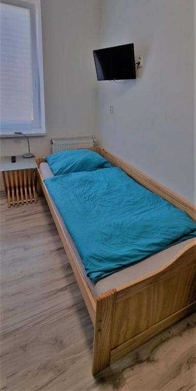 Łóżko lub łóżka w pokoju w obiekcie Ubytování Střekov Aréna