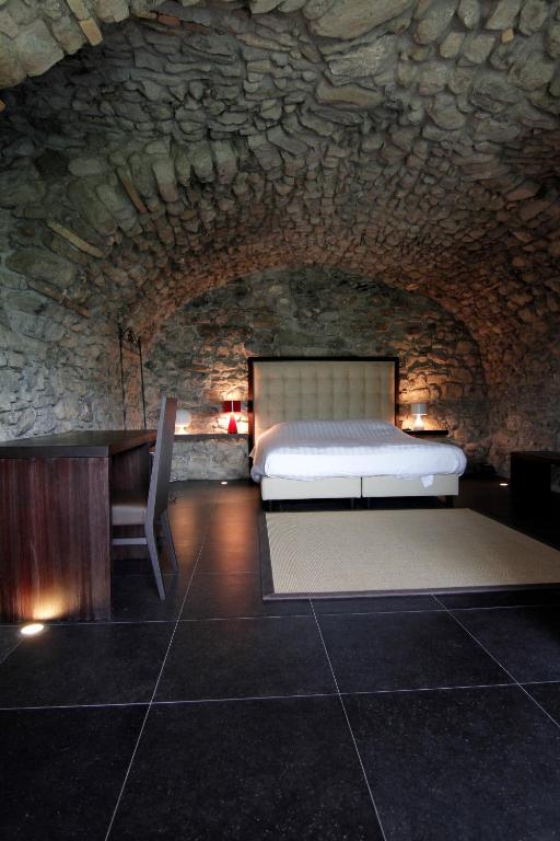 Postel nebo postele na pokoji v ubytování Hotel Corte Santa Libera