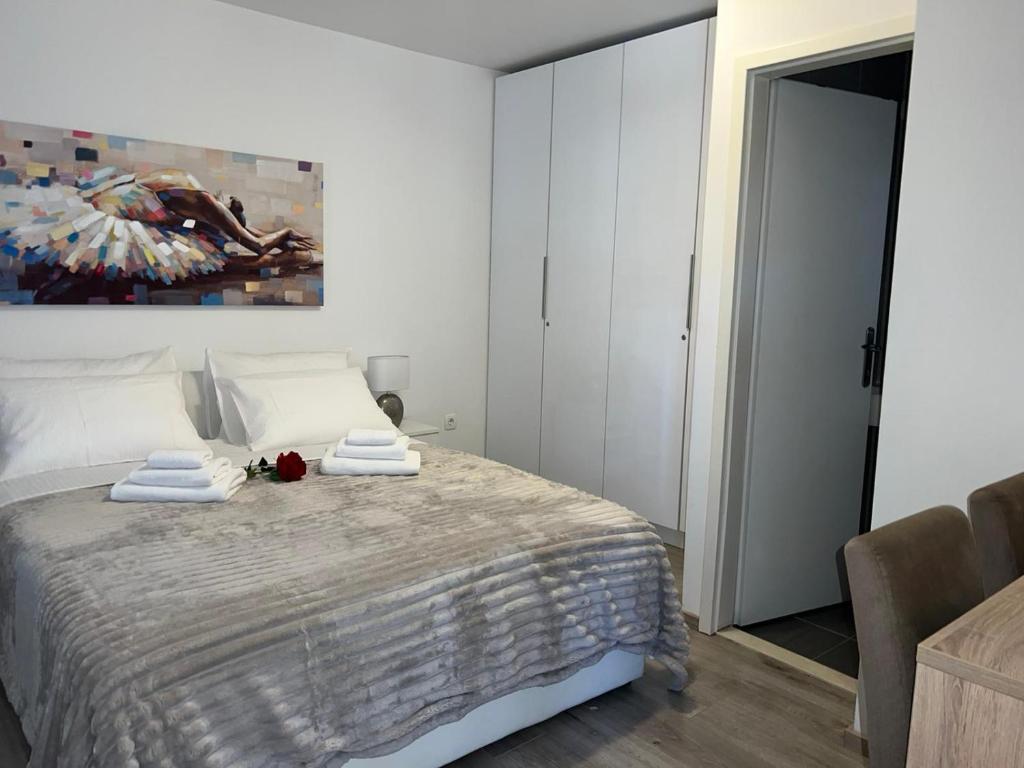 Postel nebo postele na pokoji v ubytování Rooms Marija