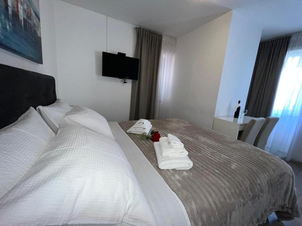 Postel nebo postele na pokoji v ubytování Rooms Marija