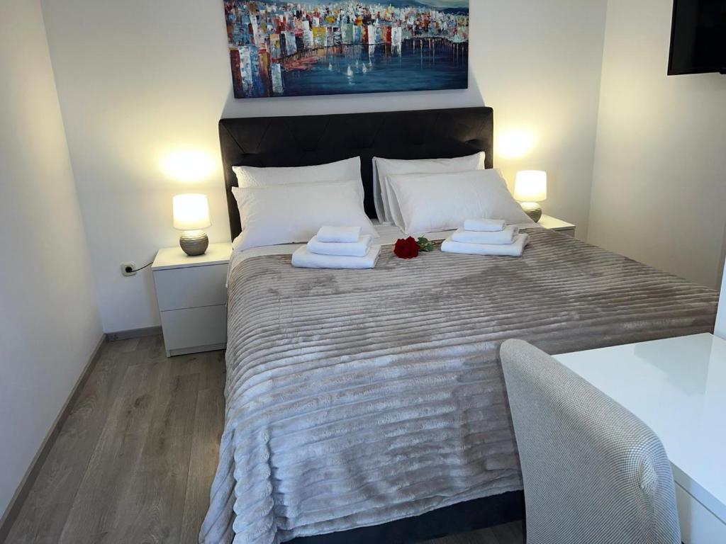 Postel nebo postele na pokoji v ubytování Rooms Marija