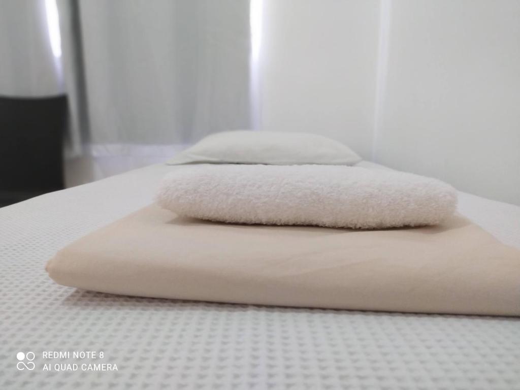 Ein Bett oder Betten in einem Zimmer der Unterkunft Ap da Thay - Os tropeiros