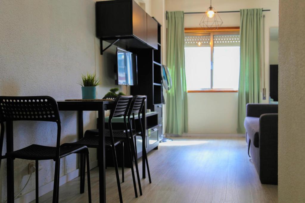 TV a/nebo společenská místnost v ubytování Bonsai Apartment I
