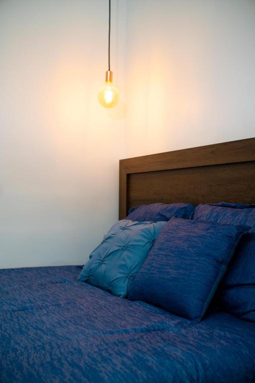 Postel nebo postele na pokoji v ubytování Doral Executive Apartments