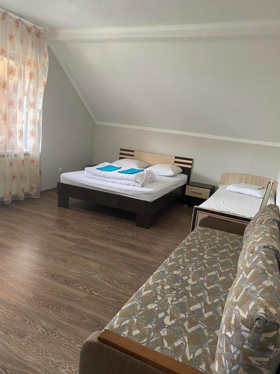 Postel nebo postele na pokoji v ubytování VIP hostel