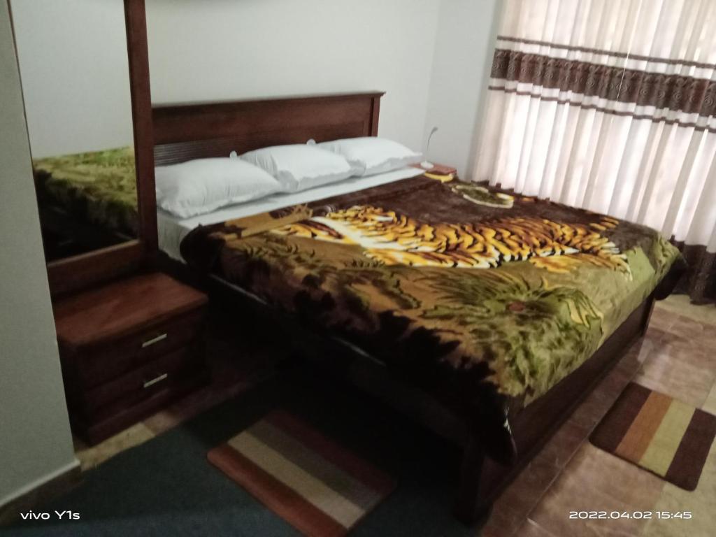 Postel nebo postele na pokoji v ubytování 'Franklyn', Homestay