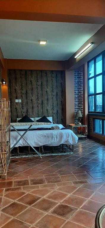 Postel nebo postele na pokoji v ubytování Looniva Guest House
