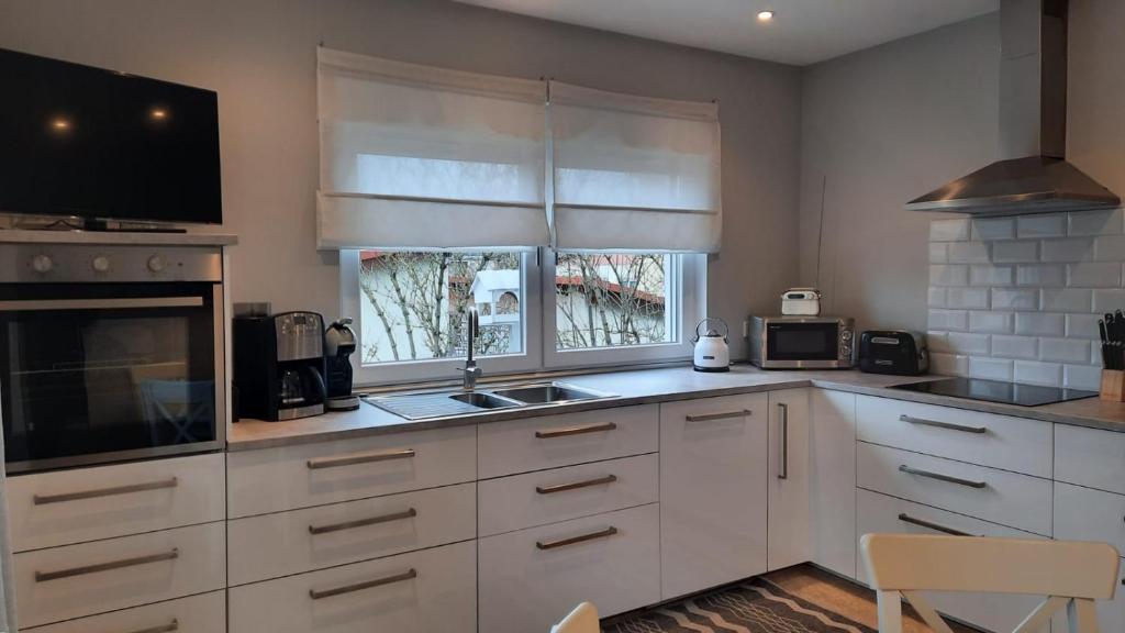 Kuchyň nebo kuchyňský kout v ubytování Ferienhaus "Villa am Eck"