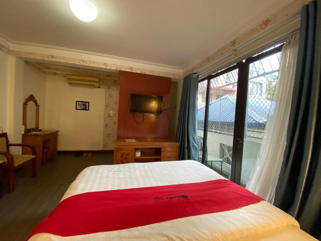 Postel nebo postele na pokoji v ubytování Sophie hotel