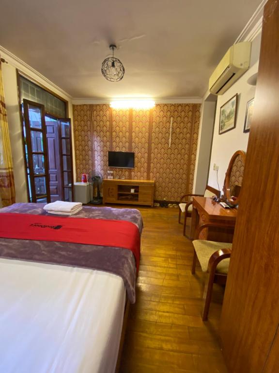 Postel nebo postele na pokoji v ubytování Sophie hotel
