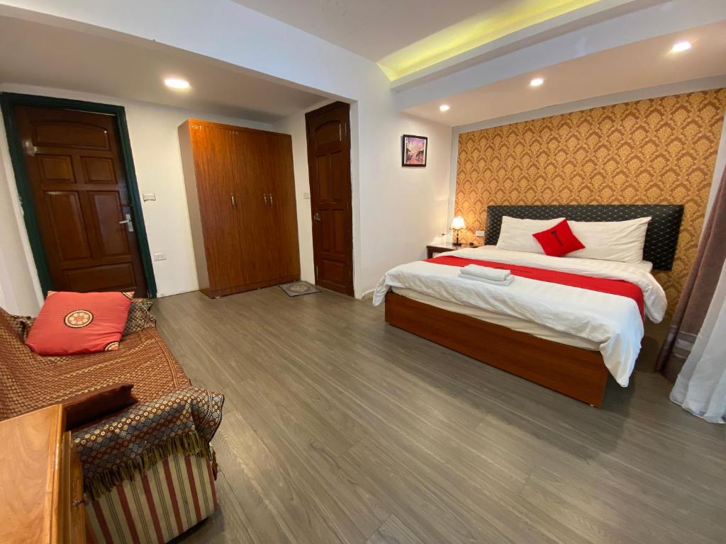 Postel nebo postele na pokoji v ubytování Sophie hotel