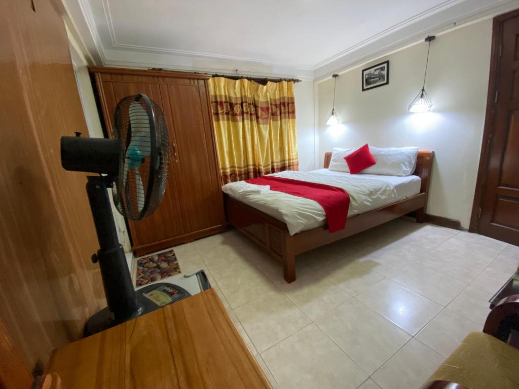 Postel nebo postele na pokoji v ubytování Sophie hotel