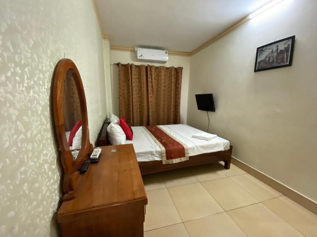 Postel nebo postele na pokoji v ubytování Sophie hotel