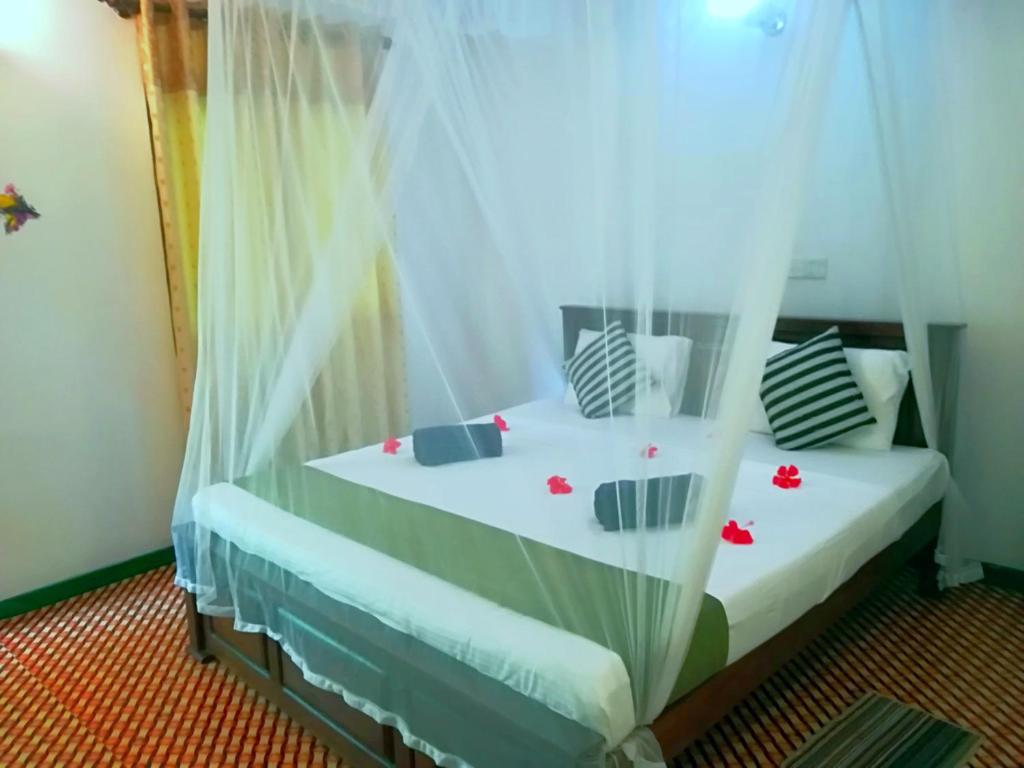 Postel nebo postele na pokoji v ubytování Lakmal Homestay ,10 minutes to Sigiriya Rock
