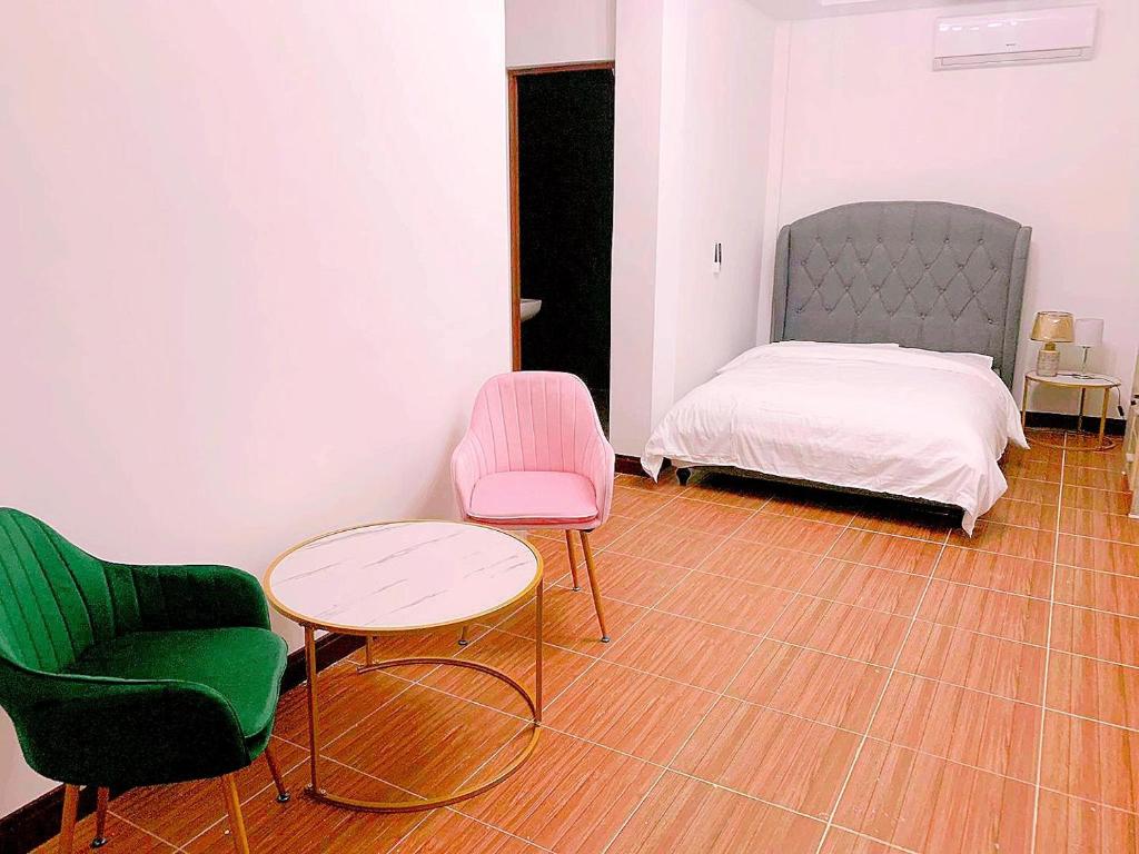 Postel nebo postele na pokoji v ubytování House of Aice