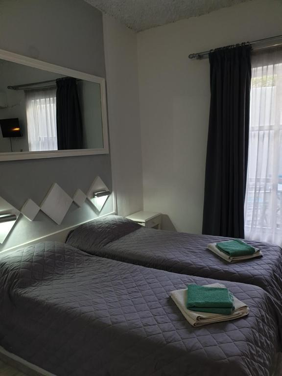 Uma cama ou camas num quarto em Porto Castello