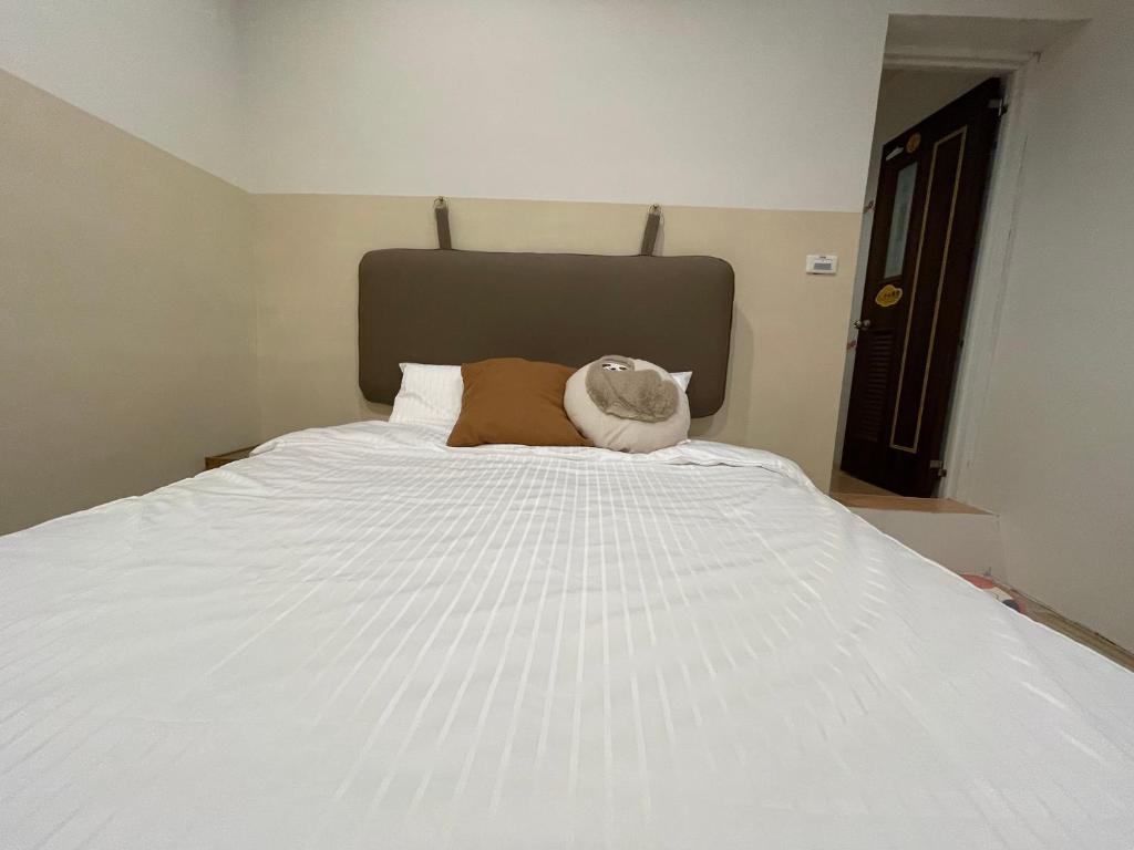 Postel nebo postele na pokoji v ubytování 蒲Going旅宿