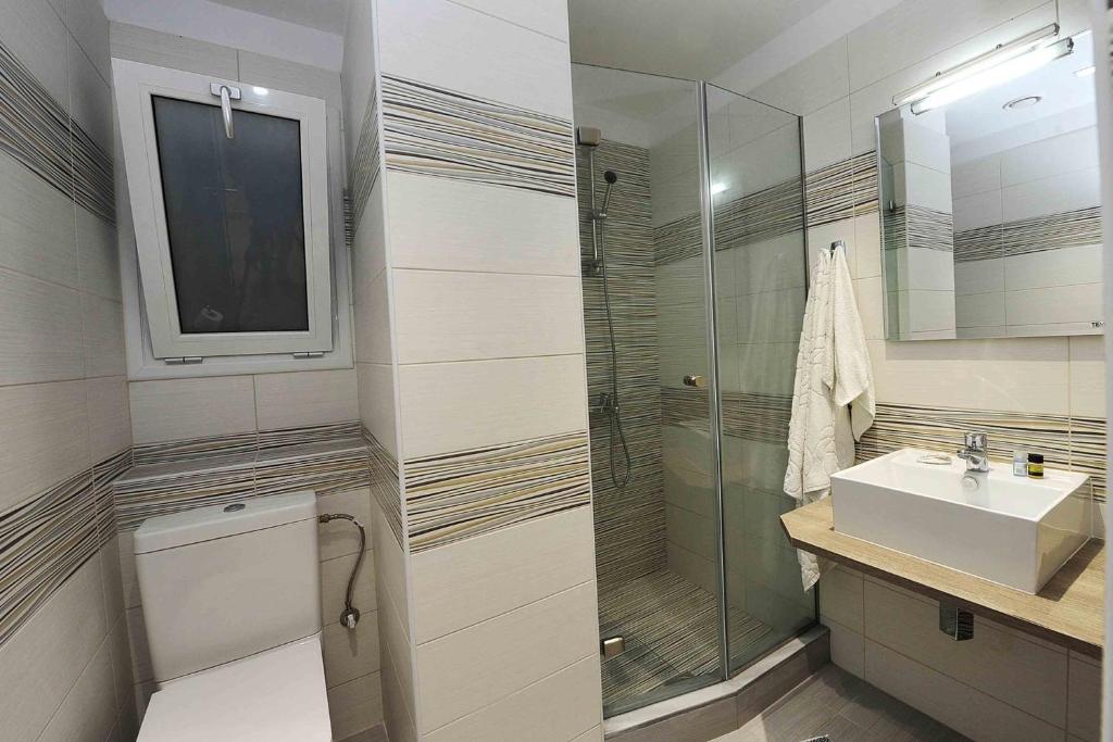 Koupelna v ubytování Hotel Kakanakos