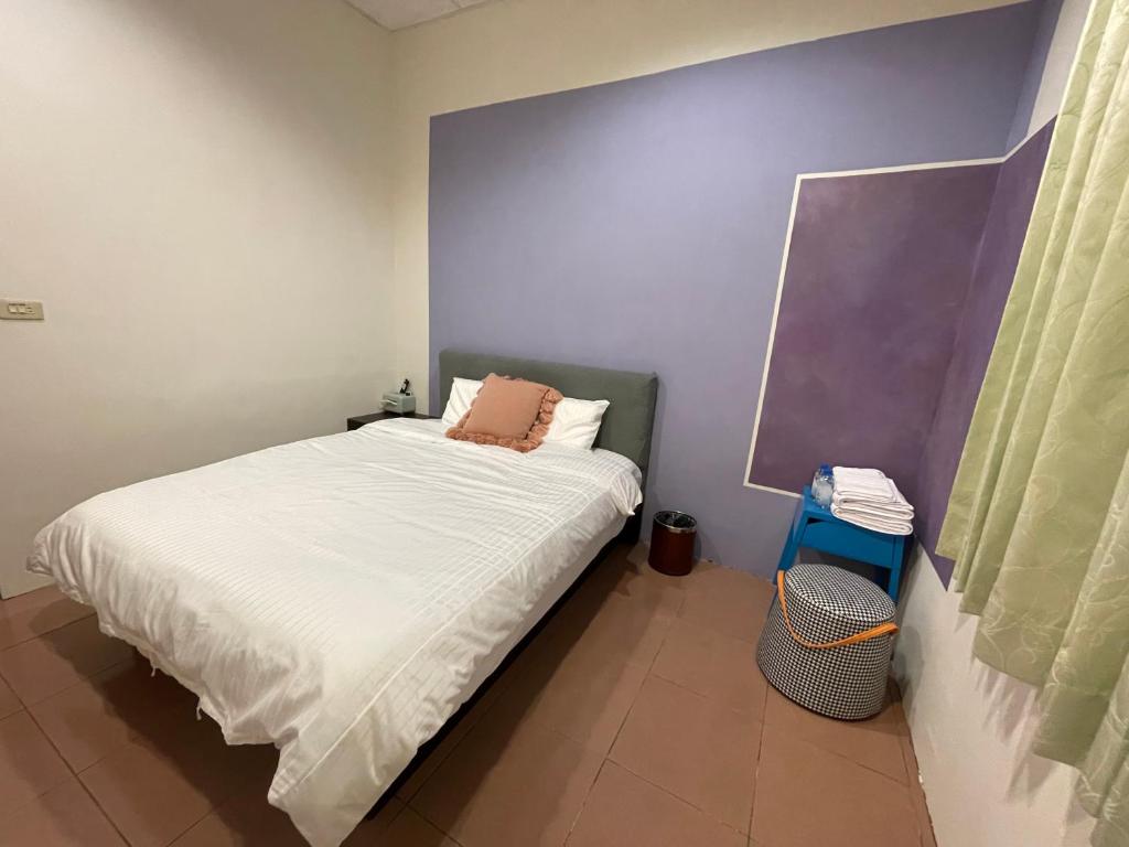 Postel nebo postele na pokoji v ubytování 蒲Going旅宿