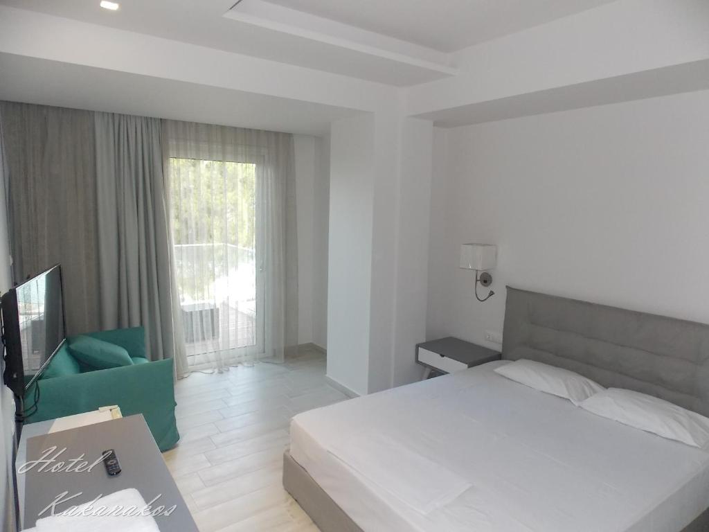 Postel nebo postele na pokoji v ubytování Hotel Kakanakos