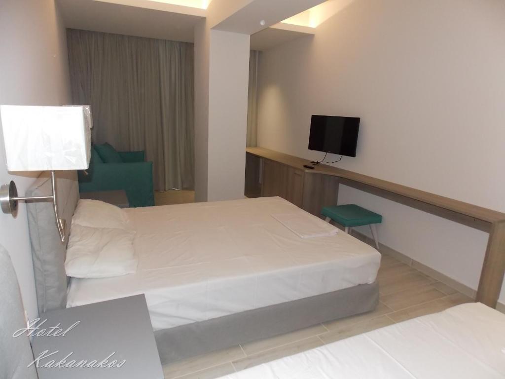 Postel nebo postele na pokoji v ubytování Hotel Kakanakos