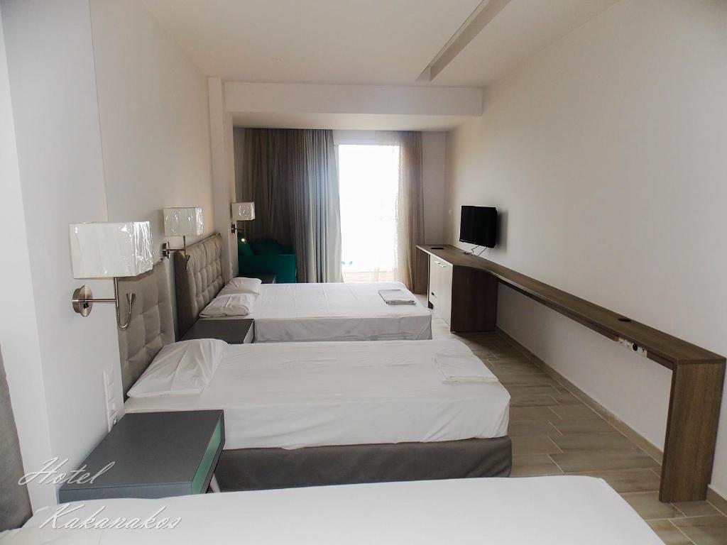Postel nebo postele na pokoji v ubytování Hotel Kakanakos