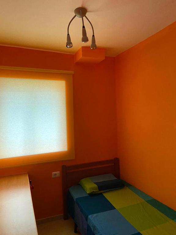 Posteľ alebo postele v izbe v ubytovaní APARTAMENTO PUERTITO DE GUIMAR TEO