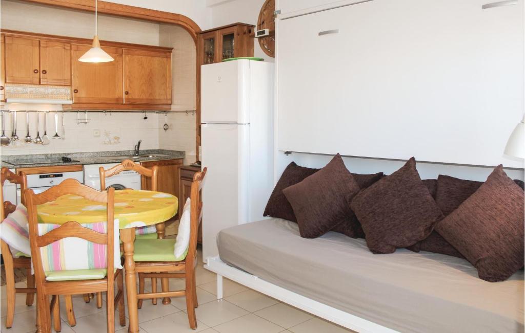 A kitchen or kitchenette at Nice Apartment In Torrevieja-La Mata