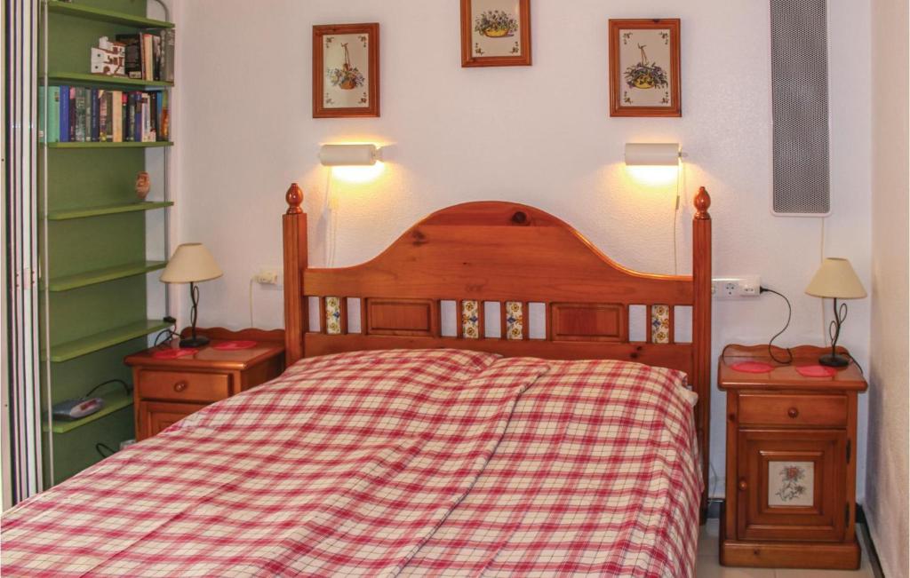A bed or beds in a room at Nice Apartment In Torrevieja-La Mata