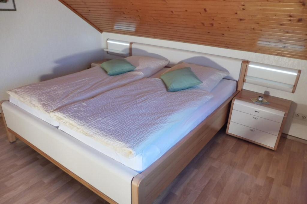 Postel nebo postele na pokoji v ubytování Ferienwohnung Vogelsang