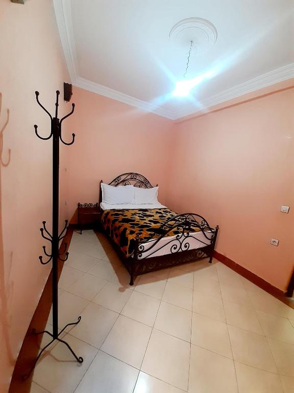 Postel nebo postele na pokoji v ubytování Hotel salem leksor