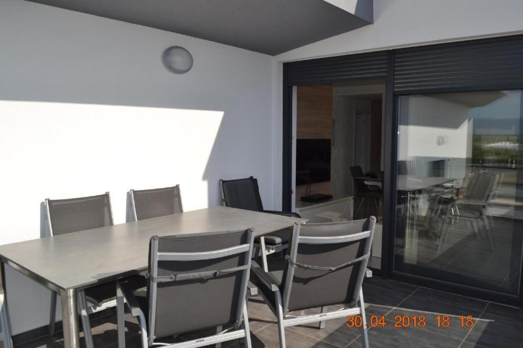 Balkón alebo terasa v ubytovaní My Paradies - Njivice Penthouse***