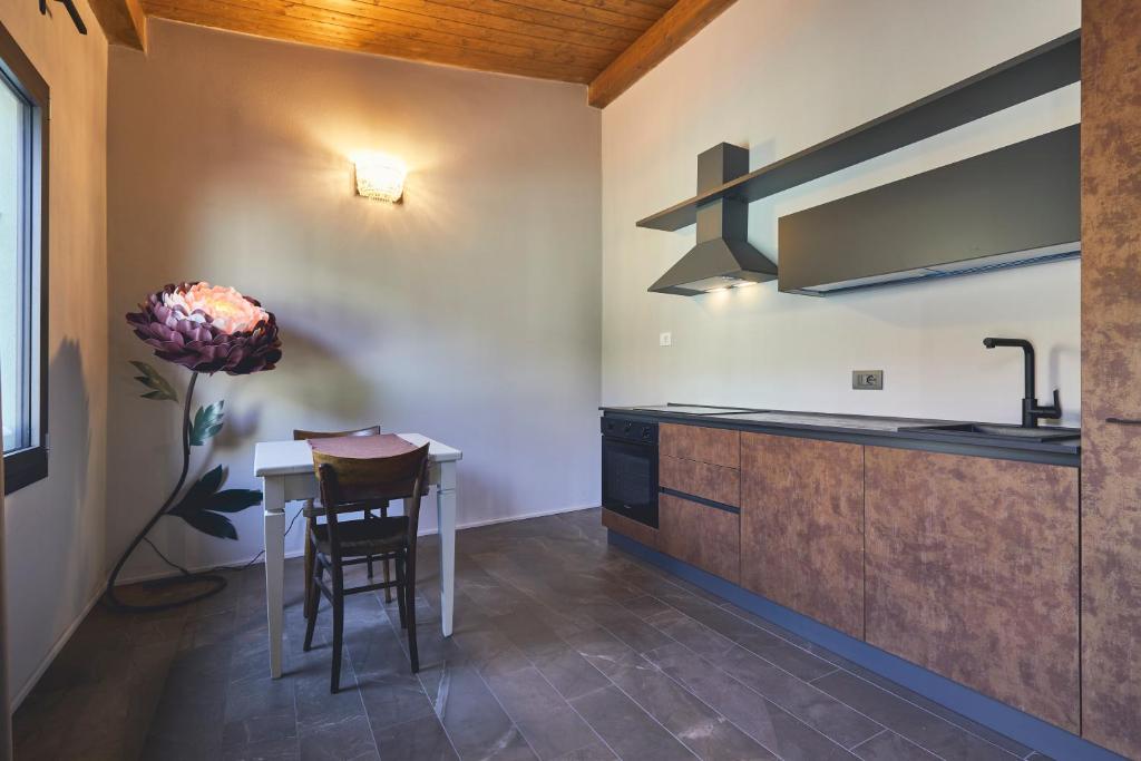 Kuchyň nebo kuchyňský kout v ubytování Le Stagioni Luxury Suite