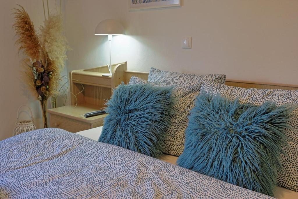 Postel nebo postele na pokoji v ubytování Luxury Apartman Alex with sauna & jacuzzi in the village