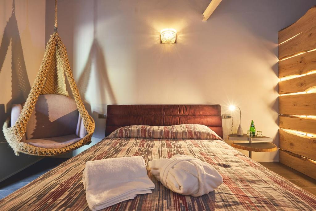 Postel nebo postele na pokoji v ubytování Le Stagioni Luxury Suite