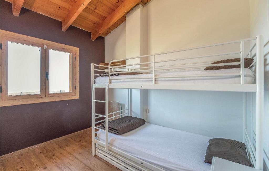 Postel nebo postele na pokoji v ubytování Cozy Home In Macanet De La Selva